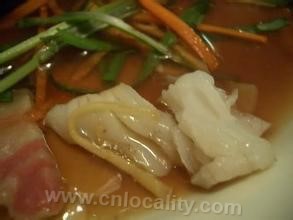 Sauté ed noodles with ginger and onion pomfret